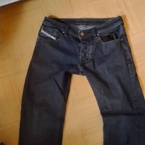 2 pairs of Diesel industry (Blue) jeans.